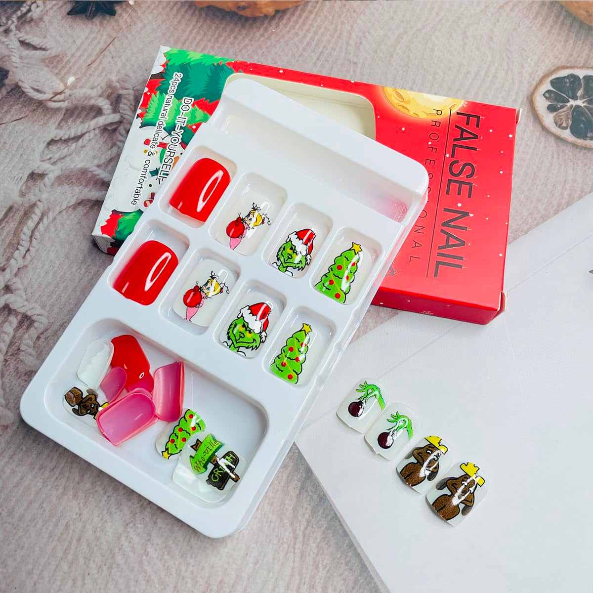 24Pcs Christmas Press on Nails Short Square Cute Petite False Nails with Green Monster Xmas Tree Girls Designs Full Cover Christmas Fake Nails Winter Acrylic Glue on Nails for Women Holiday Nail Decor